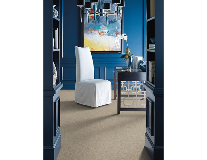 stylish room with blue walls with a chair and desk for Preston Thompson's Carpet Shoppe in Dickson